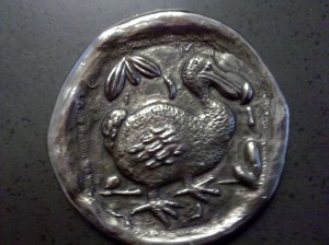The flip side of this dodo medal has an Athenian owl. It was my dad's, and my mom just gave it to my son on his birthday.